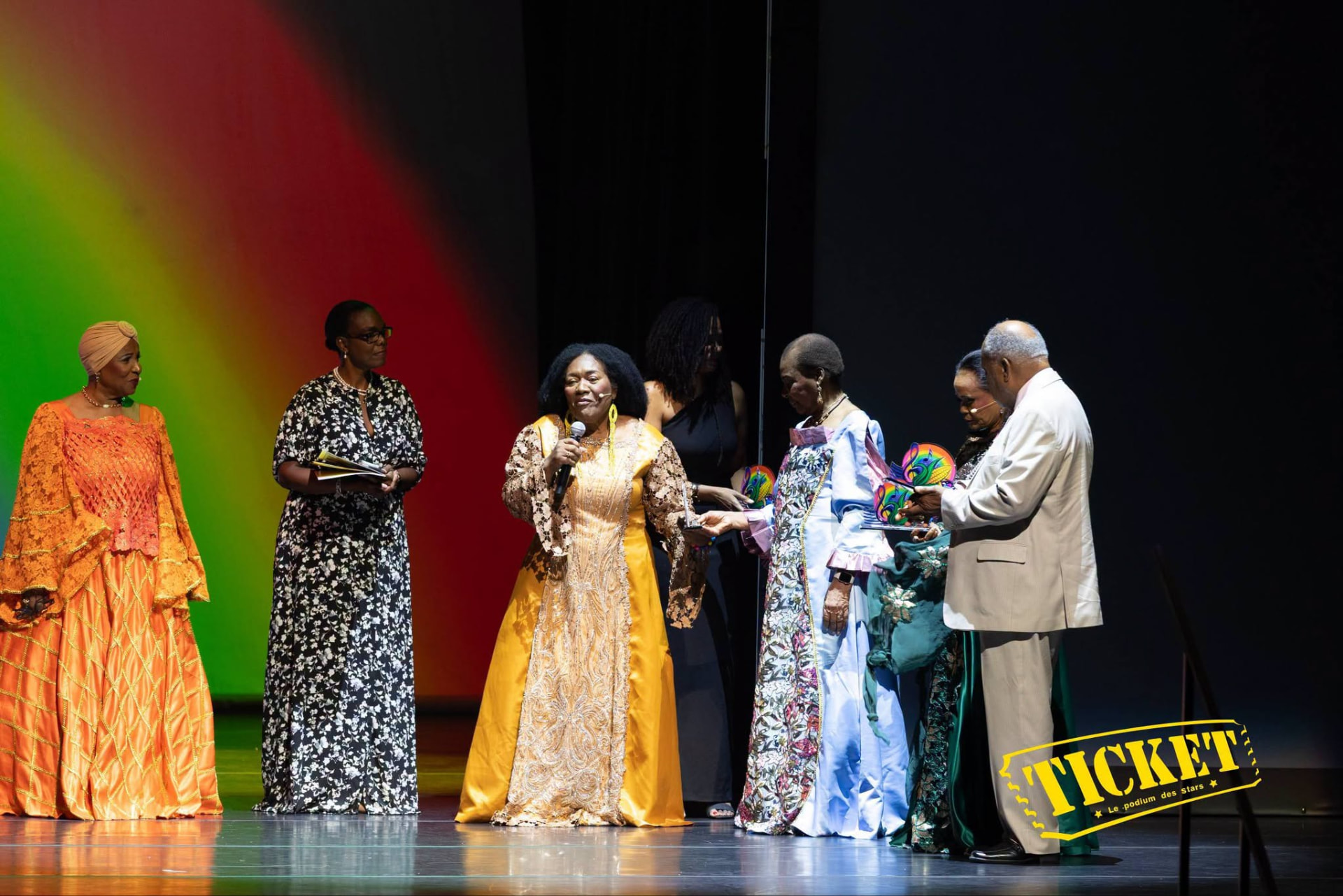 Honorees receiving awards under Haitian flag colors